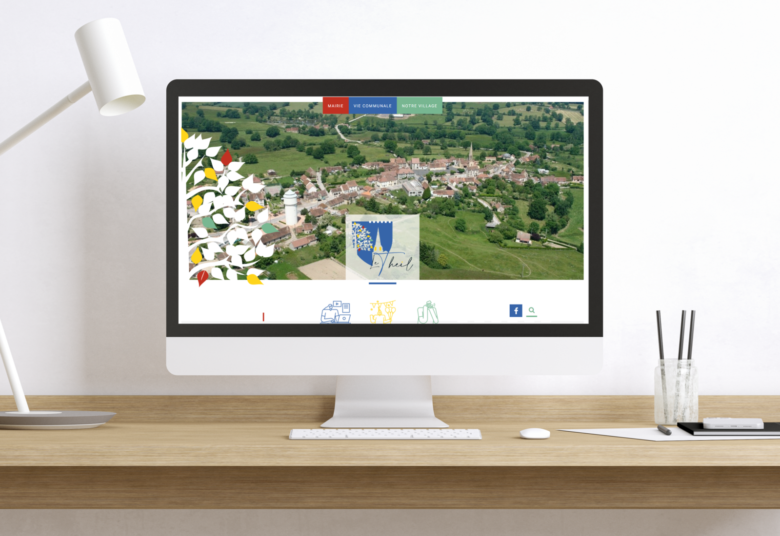 Mockup d'un ordinateur avec le site de la mairie du Theil